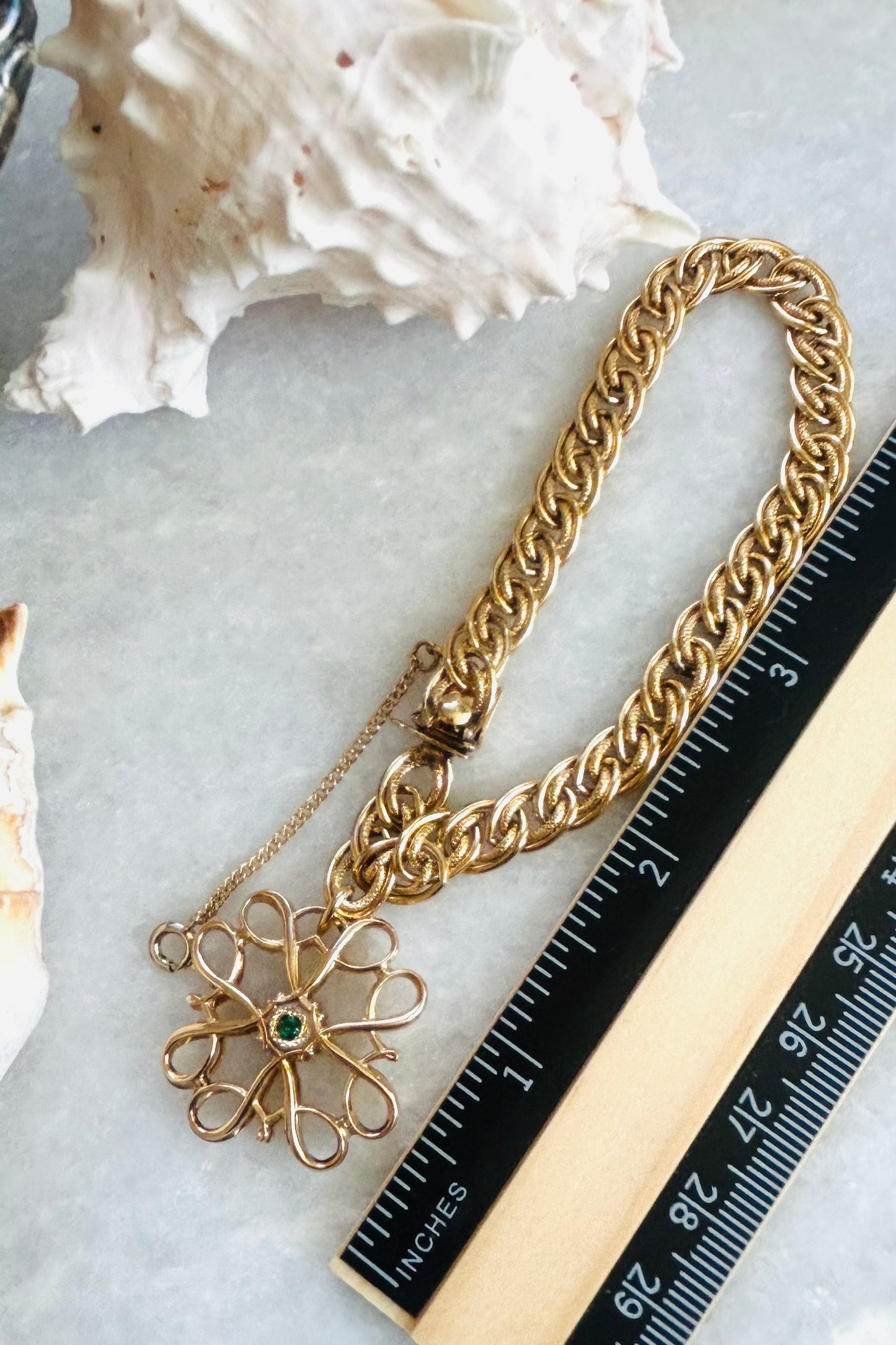 Link Bracelet with Large Flower Charm & Green Center Accent.