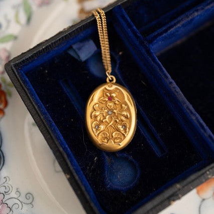 Oval Repousse Floral Locket with Red & Clear Accents